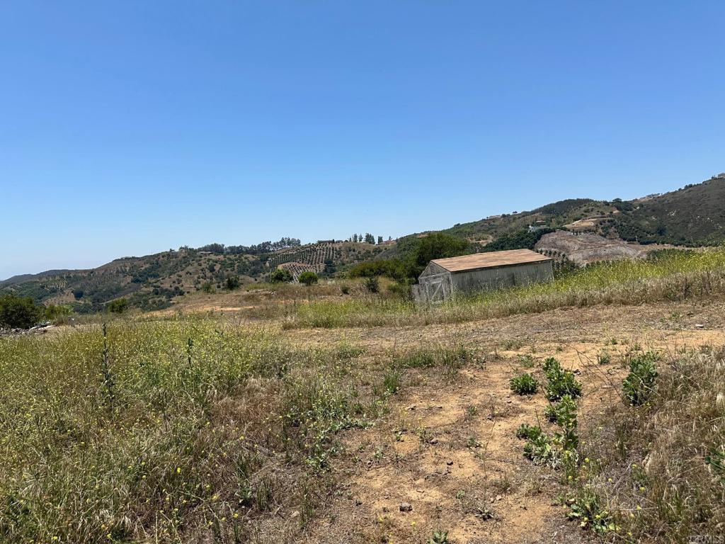 1 Vía Tornado Temecula, CA 92590 - Photo 35 of 42 a view of a lake with a mountain in the background