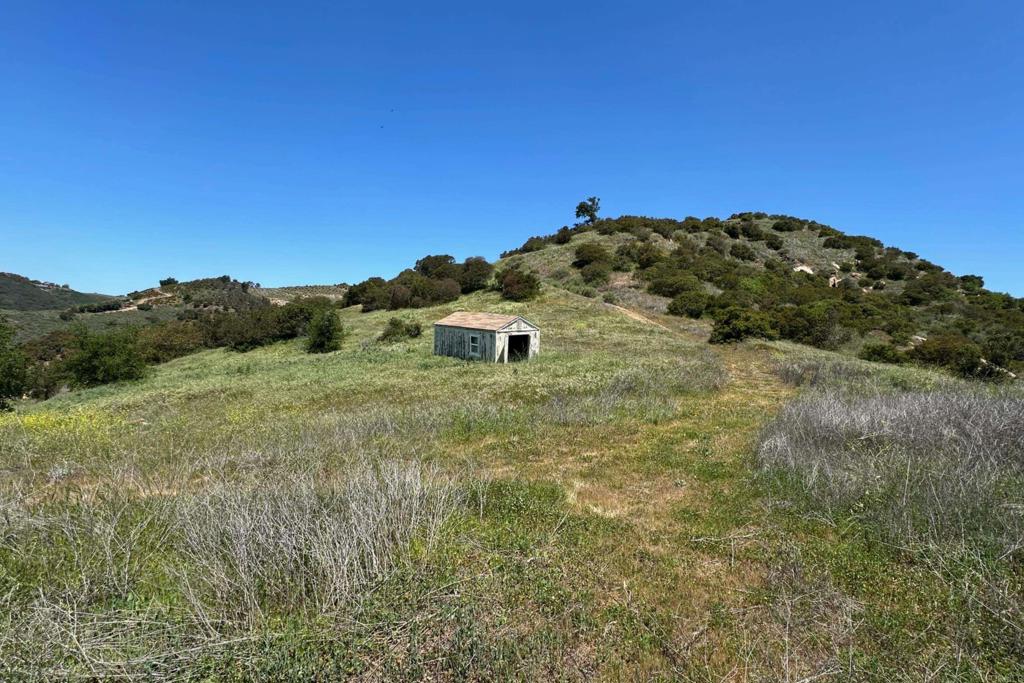 1 Vía Tornado Temecula, CA 92590 - Photo 6 of 42 a view of a big yard with a mountain