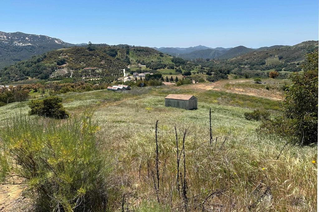 1 Vía Tornado Temecula, CA 92590 - Photo 7 of 42 a view of a lake with a mountain in the background