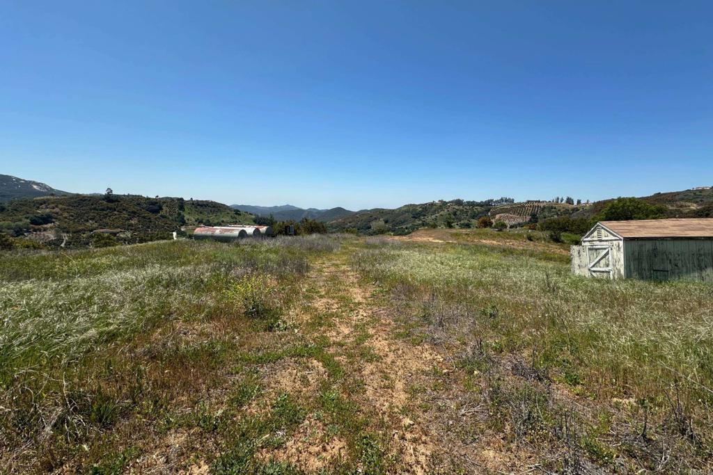 1 Vía Tornado Temecula, CA 92590 - Photo 8 of 42 a view of a lake with houses in the back