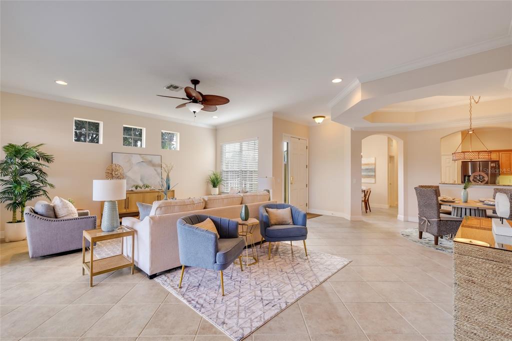 8336 Miramar Way Lakewood Ranch, FL 34202 - Photo 13 of 63 a living room with furniture and a large window