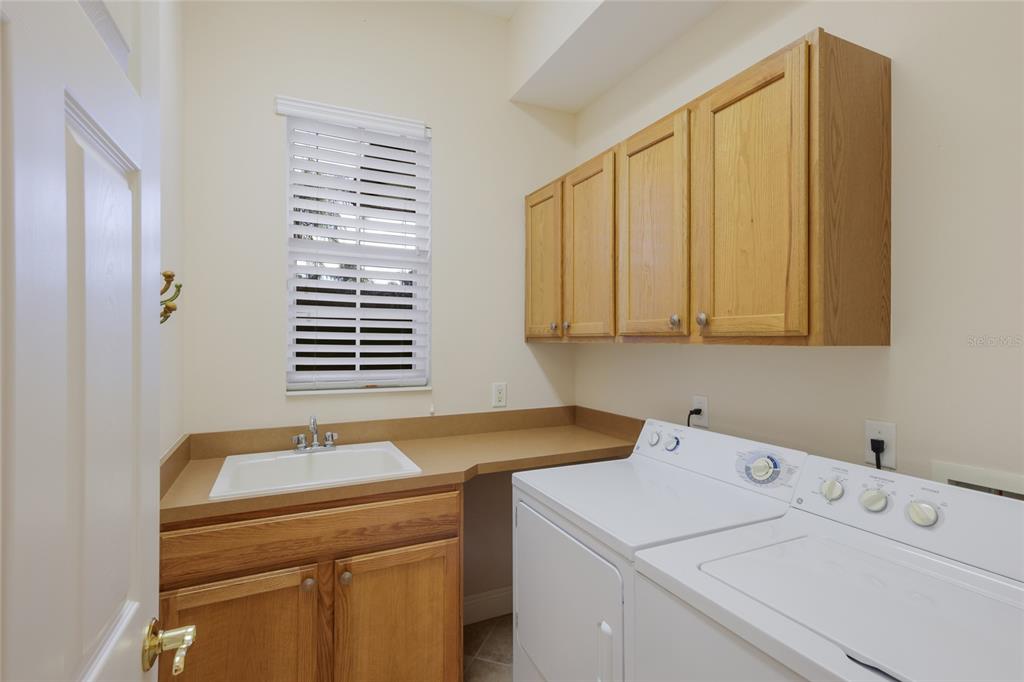 8336 Miramar Way Lakewood Ranch, FL 34202 - Photo 18 of 63 a utility room with dryer and washer
