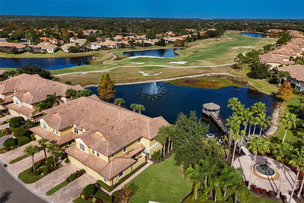 8336 Miramar Way Lakewood Ranch, FL 34202 - Photo 2 of 63 an aerial view of a house with a lake view
