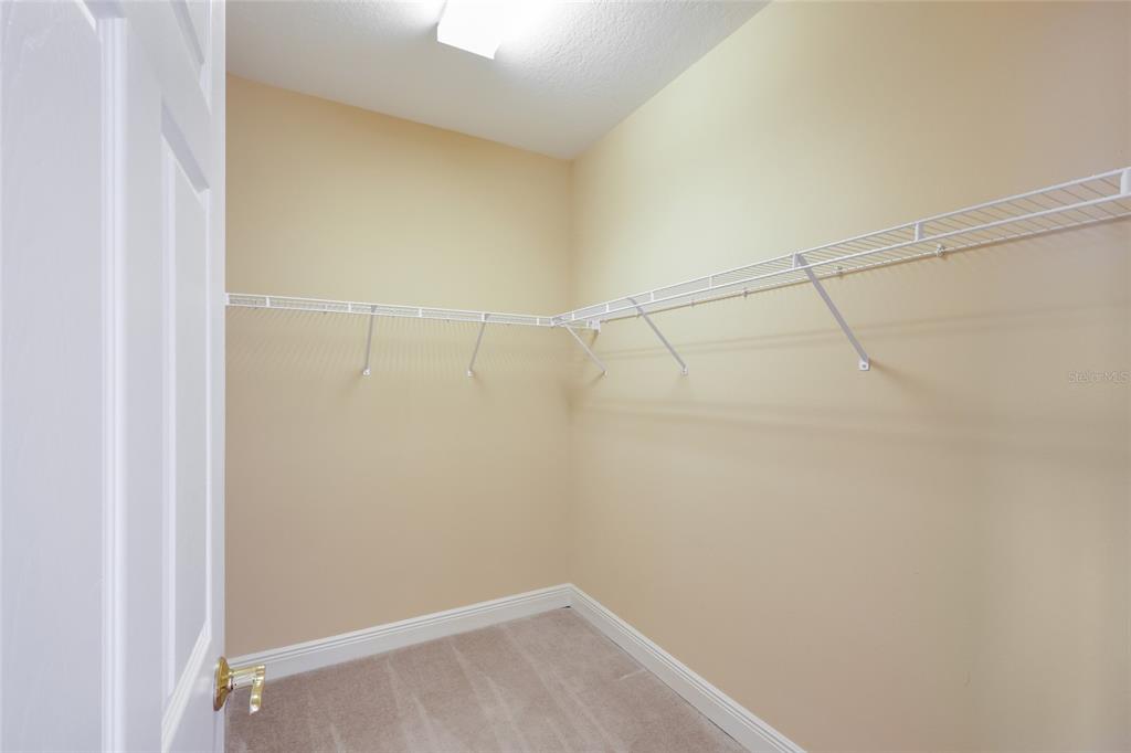 8336 Miramar Way Lakewood Ranch, FL 34202 - Photo 27 of 63 a view of a room with racks on the wall
