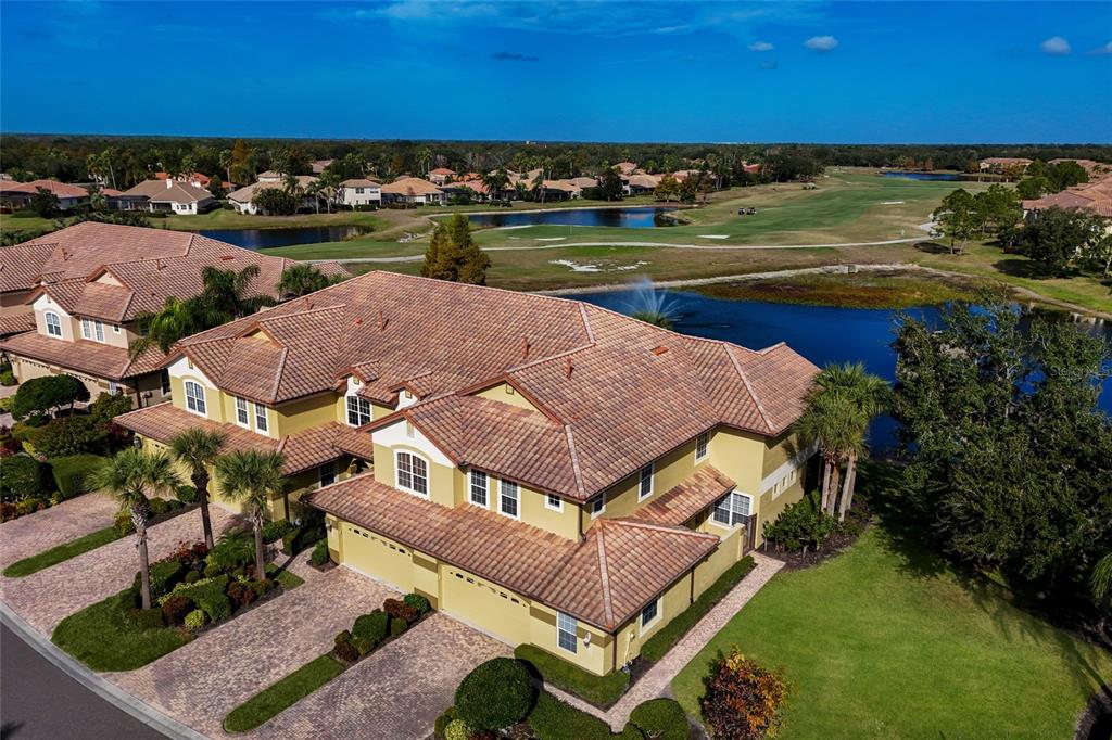 8336 Miramar Way Lakewood Ranch, FL 34202 - Photo 40 of 63 an aerial view of a house with a lake view
