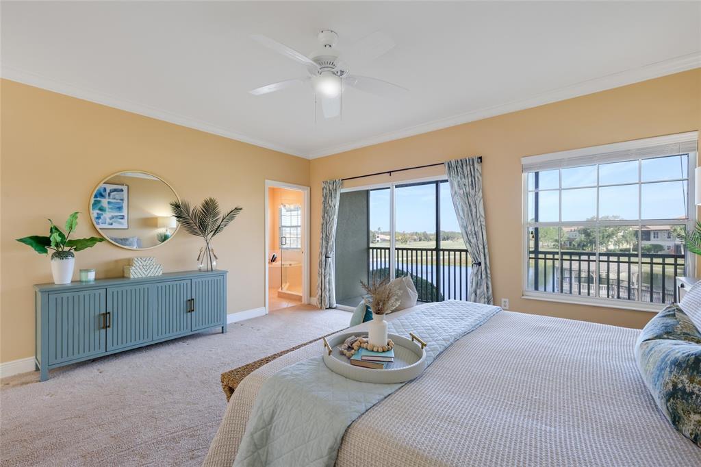 8336 Miramar Way Lakewood Ranch, FL 34202 - Photo 5 of 63 a bedroom with furniture and a window