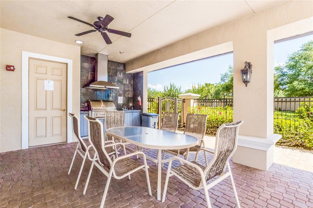 8336 Miramar Way Lakewood Ranch, FL 34202 - Photo 52 of 63 a view of a dining room with furniture window and outside view