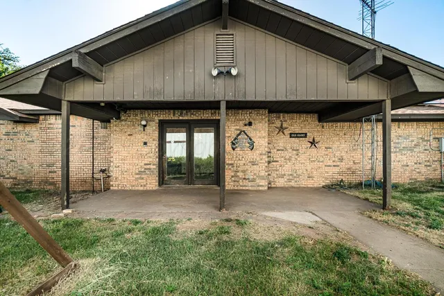 a front view of a house with a porch