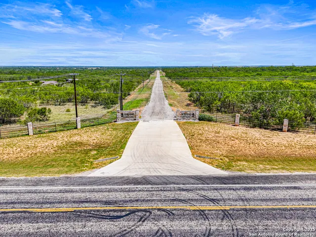 a view of swimming pool with a yard
