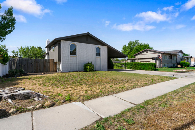 432 Calnette Drive Sandy, UT 84070 - Photo 32 of 48 Two-story residence featuring white brick and dark trim