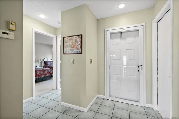 a view of a bedroom from the hallway