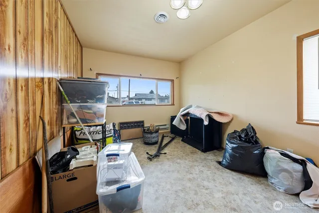 a view of an entryway with a workspace