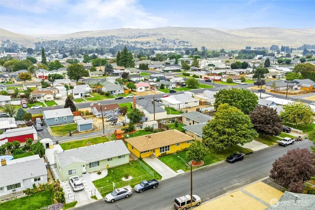 an aerial view of a house with a garden