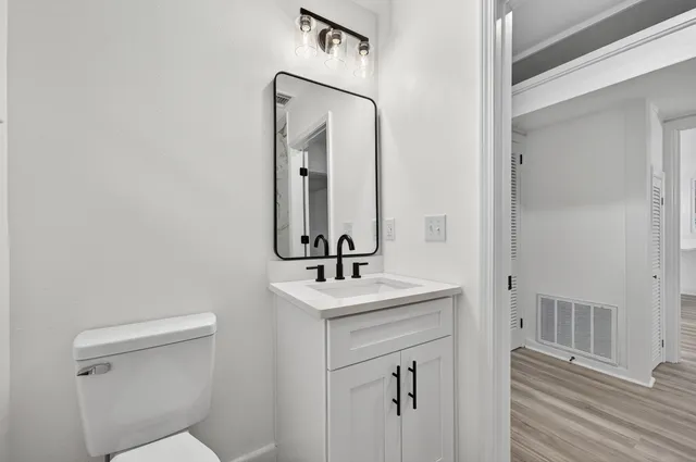 a view of a backyard with a lake view