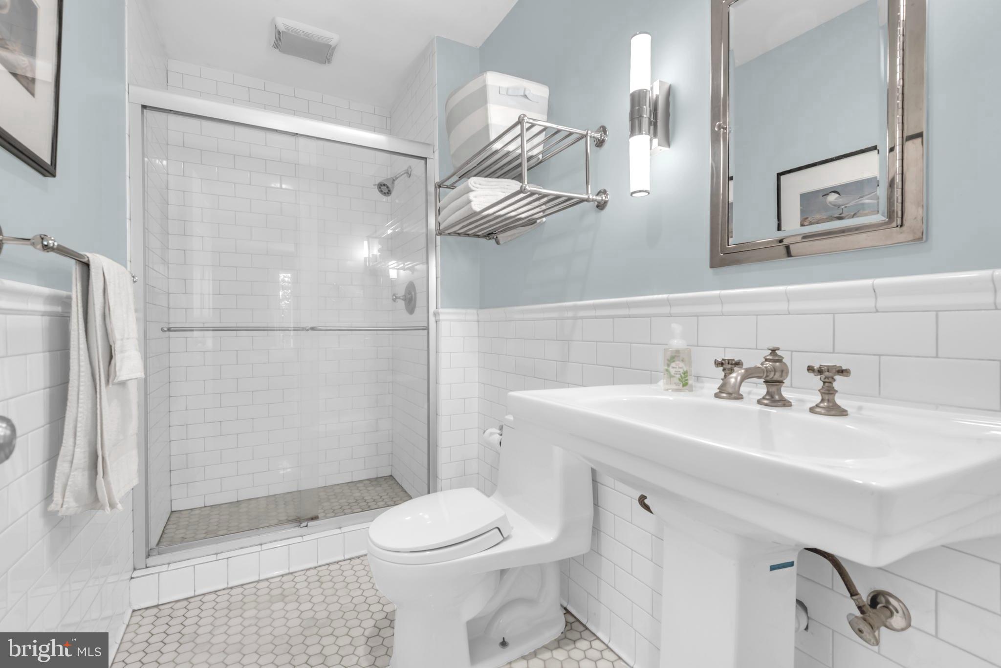 1870 Poplar Road Annapolis, MD 21401 - Photo 16 of 51 Brightly lit BR w/ceramic shower.