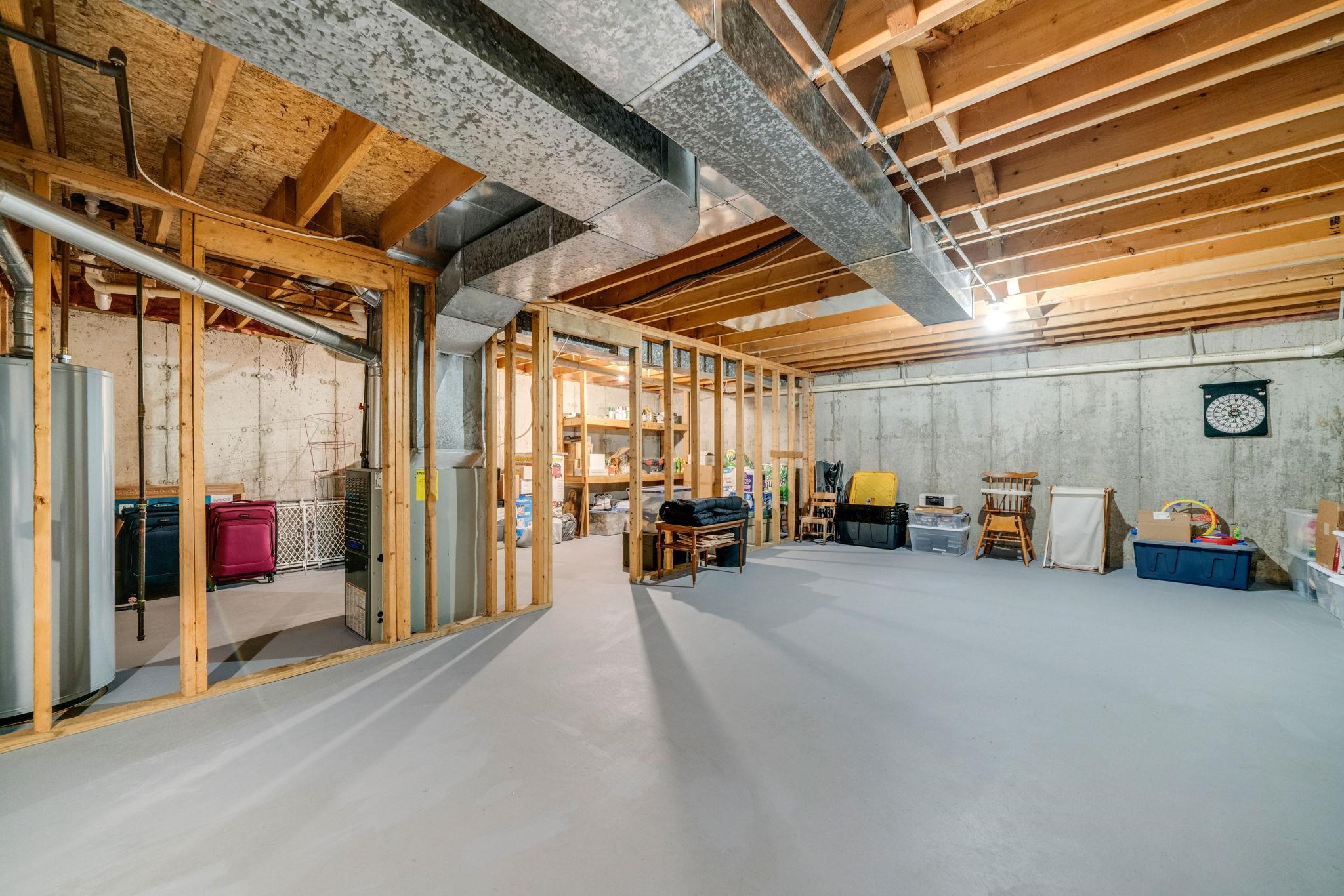 6395 Greystone Roscoe, IL 61073 - Photo 25 of 32 a view of a garage with storage