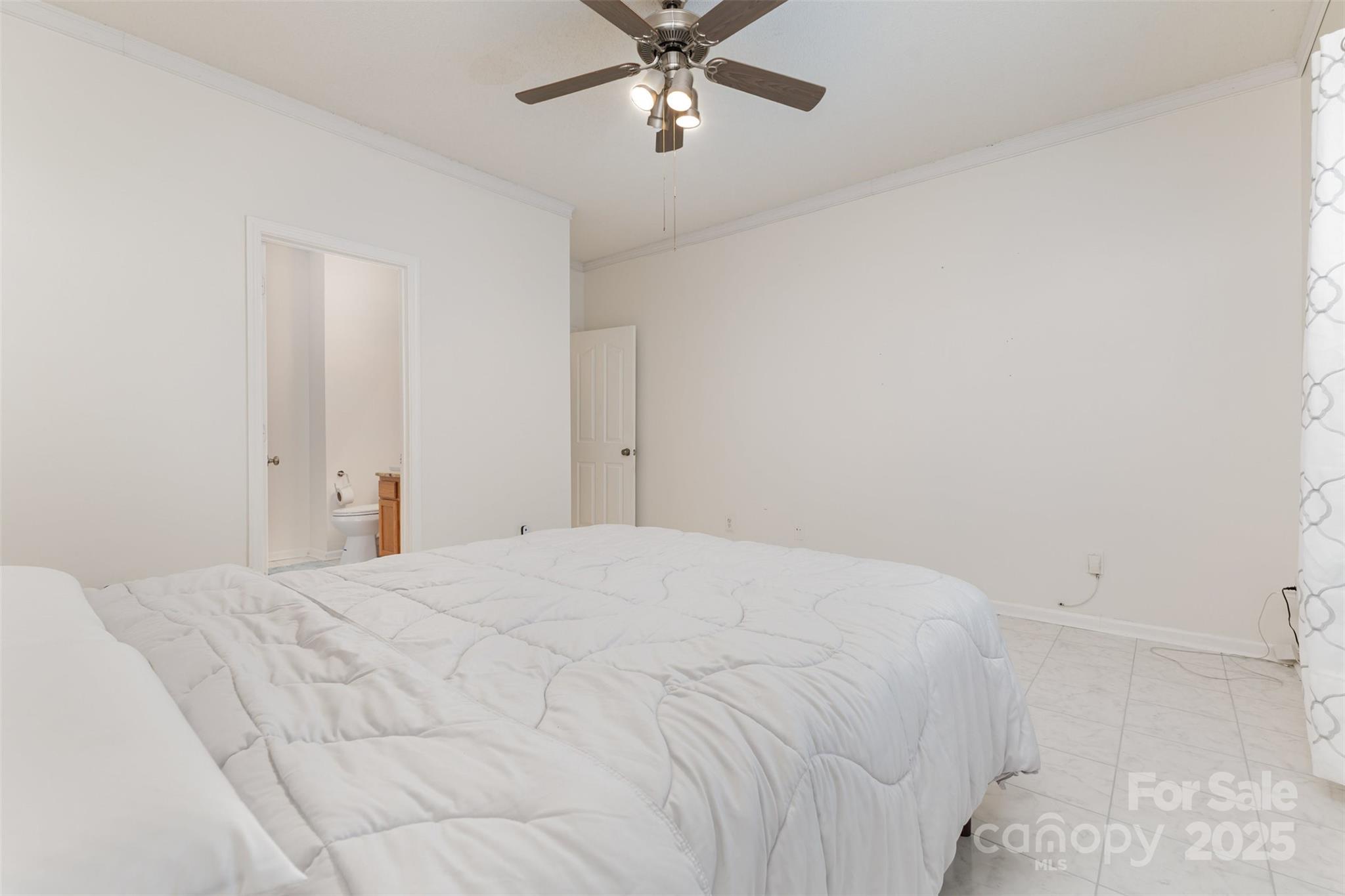 13521 Michael Lynn Road Charlotte, NC 28278 - Photo 20 of 34 a bedroom with a bed and window