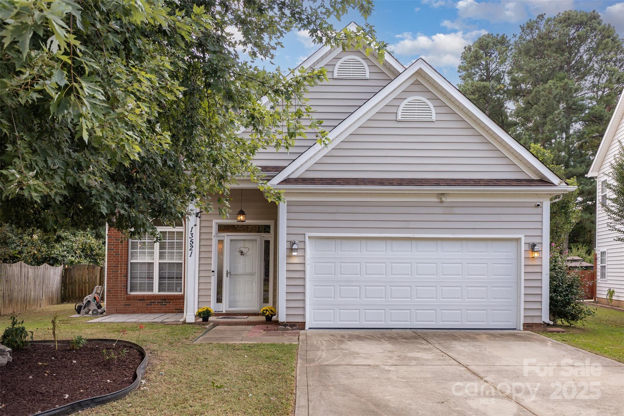 13521 Michael Lynn Road Charlotte, NC 28278 - Photo 32 of 34 a front view of a house with garden