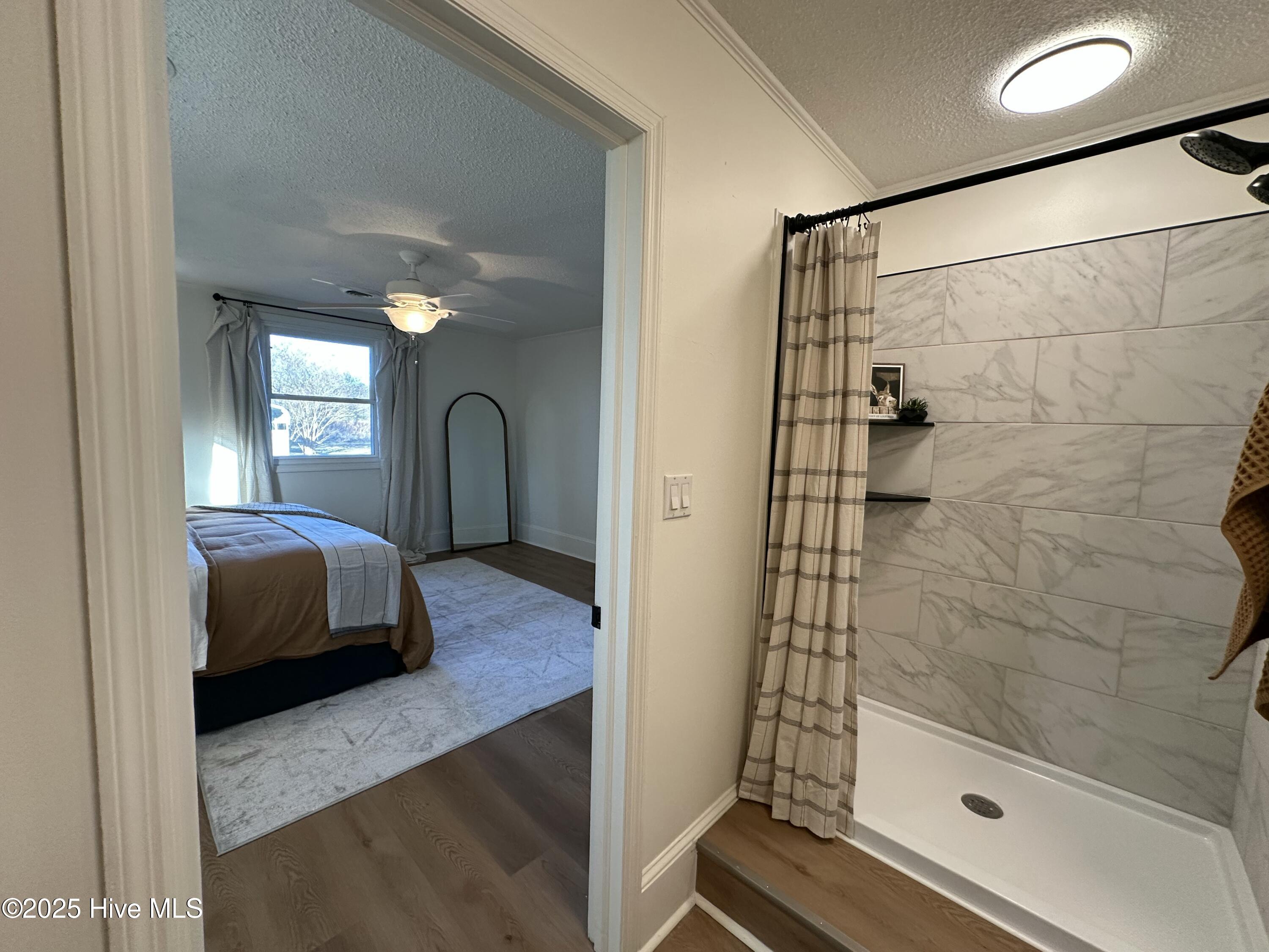 111 Asbury Road Cove City, NC 28523 - Photo 8 of 52 master bath into m bedroom