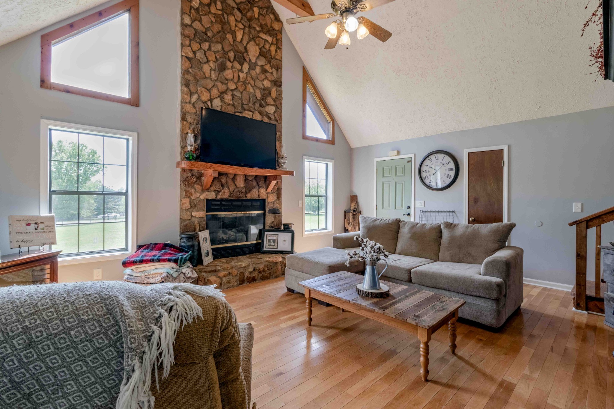 946 Hayes Ridge Road Indian Mound, TN 37079 - Photo 7 of 23 a living room with fireplace furniture and a flat screen tv