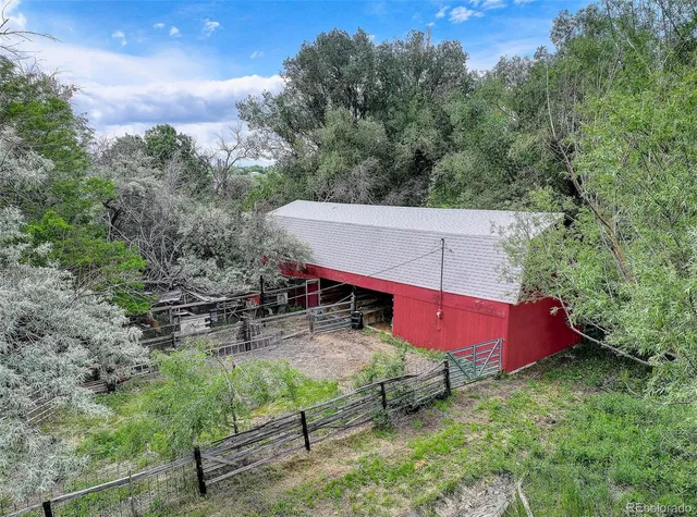 an outdoor sitting area with golf course