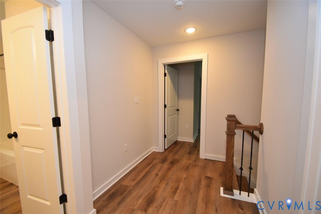 1749 Hollands Road Palmyra, VA 22963 - Photo 34 of 40 Corridor featuring dark wood-type flooring, an ups