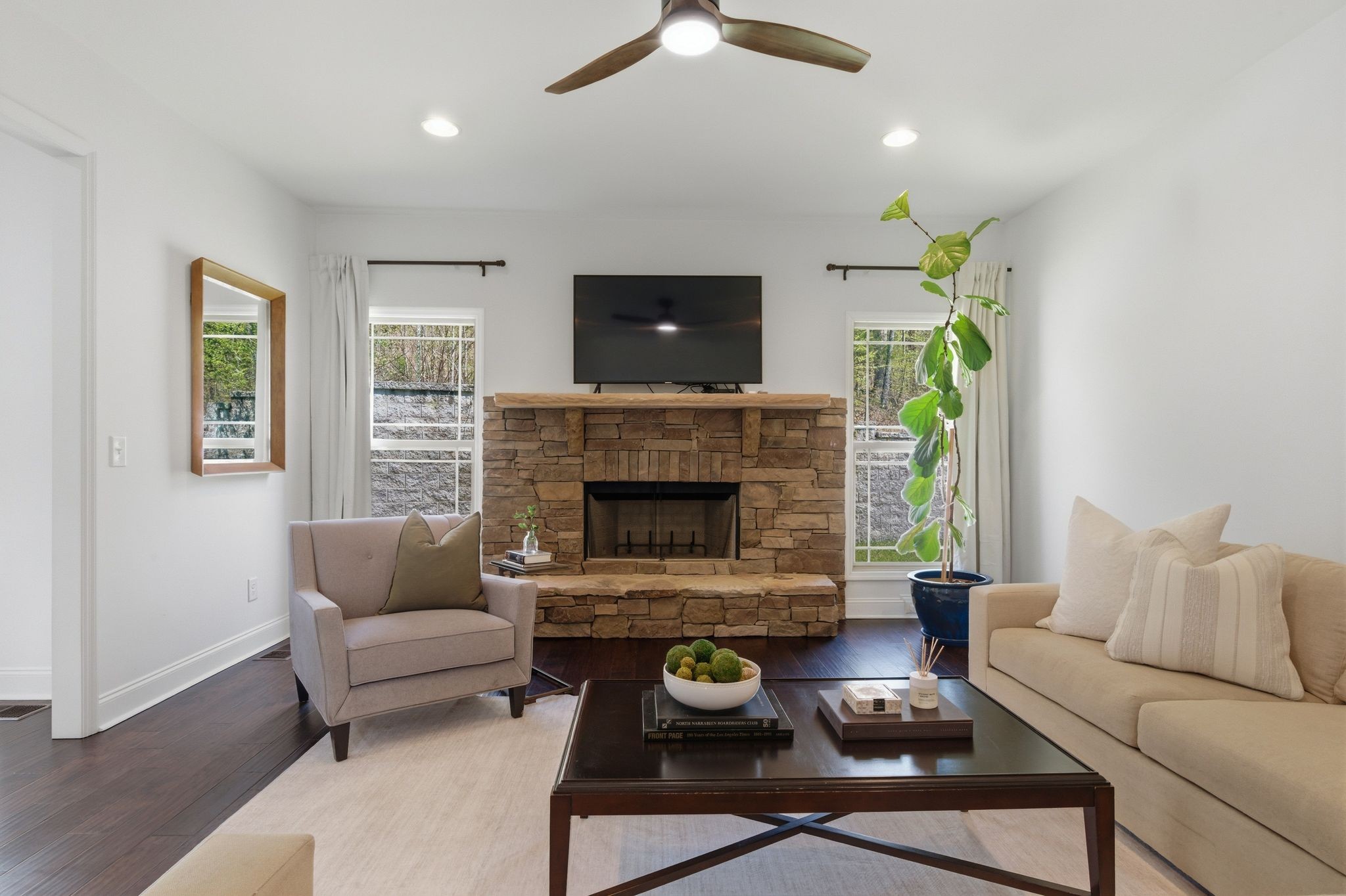 1075 Garland Hollow Road Pegram, TN 37143 - Photo 16 of 57 a living room with furniture and a fireplace