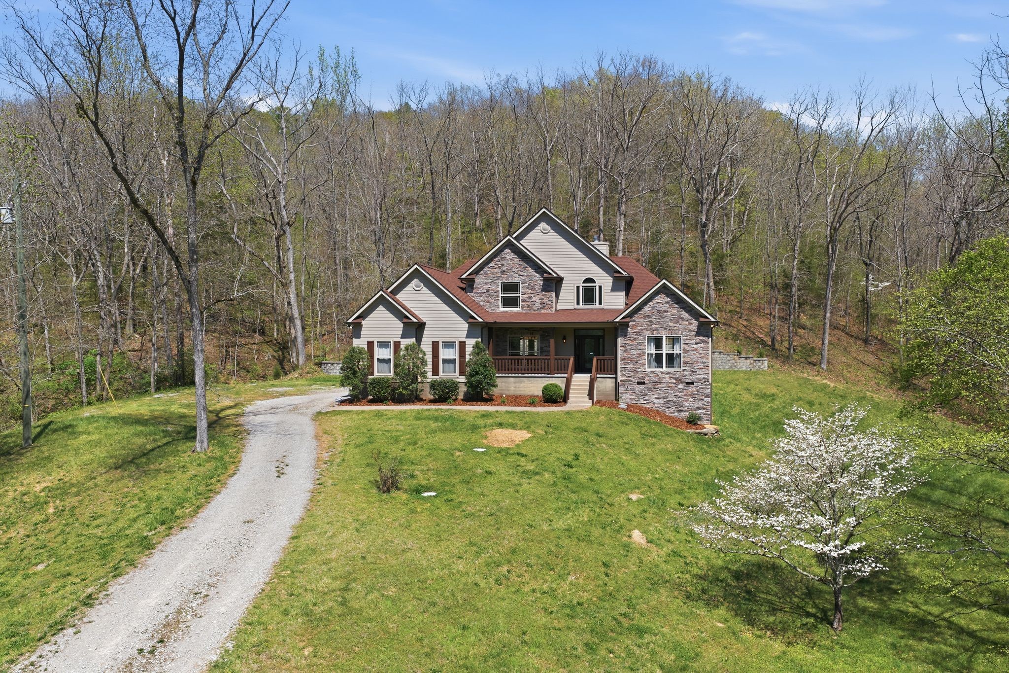 1075 Garland Hollow Road Pegram, TN 37143 - Photo 50 of 57 a front view of a house with yard