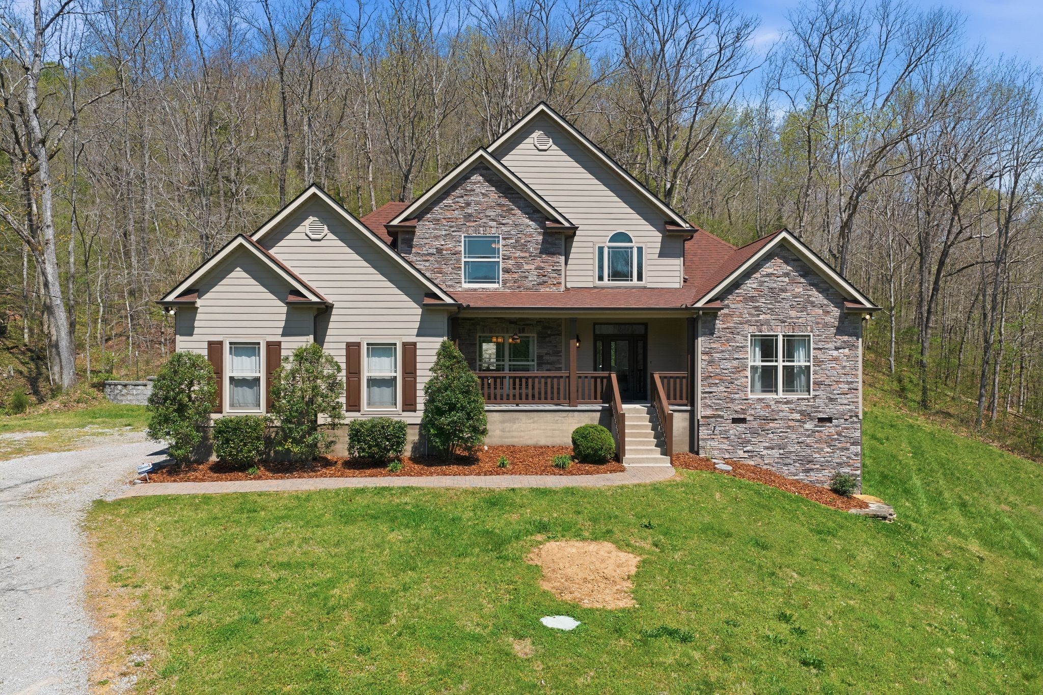 1075 Garland Hollow Road Pegram, TN 37143 - Photo 56 of 57 a front view of a house with garden