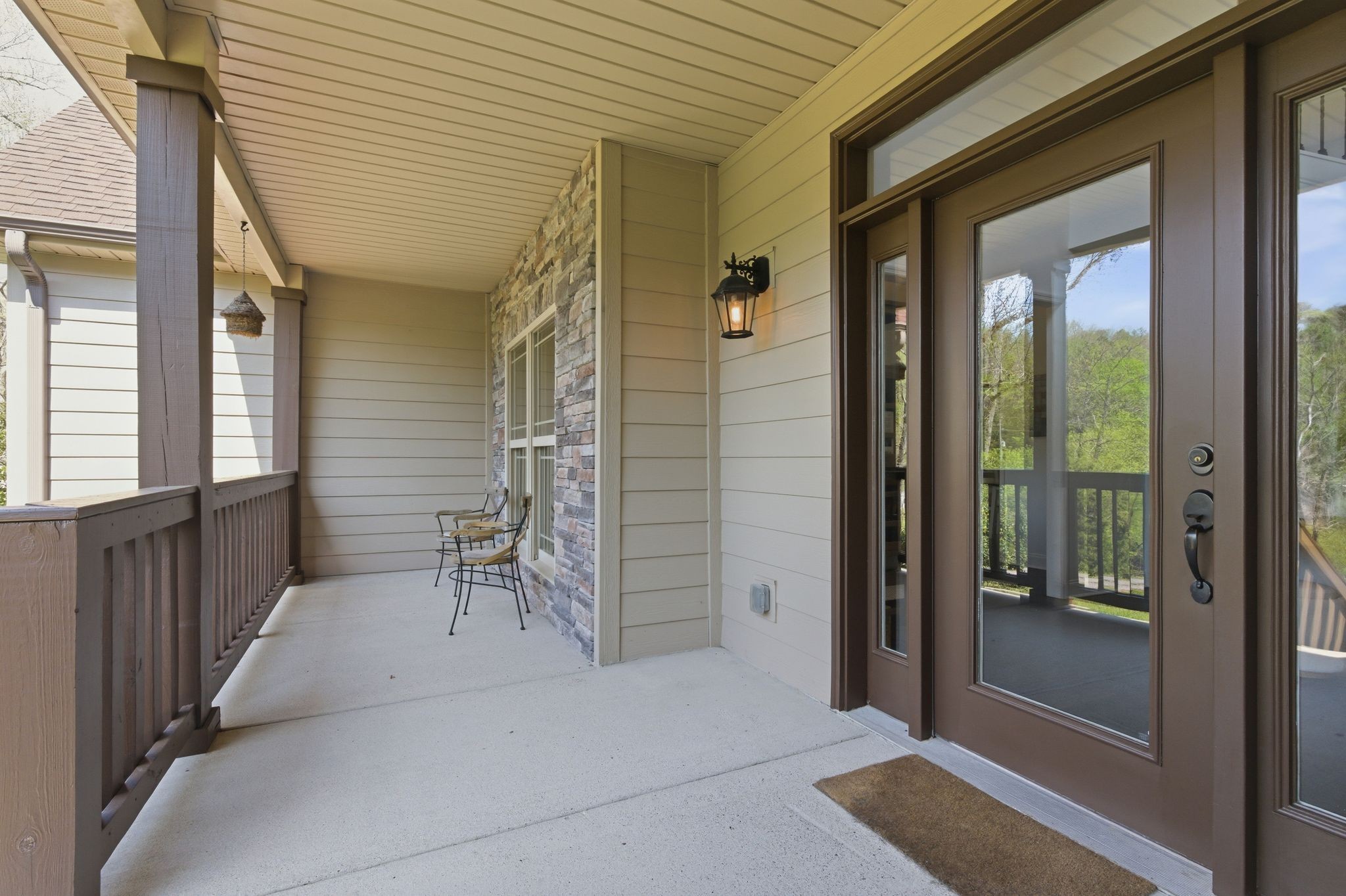1075 Garland Hollow Road Pegram, TN 37143 - Photo 6 of 57 a view of a porch with a table and chairs