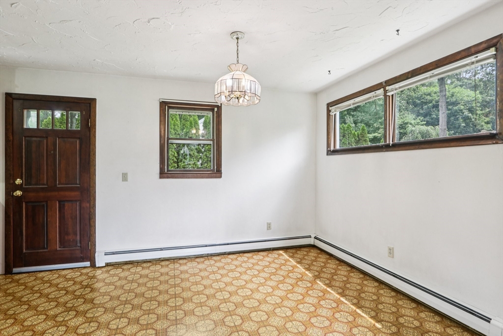 16 Indian Run Road Bellingham, MA 02019 - Photo 12 of 34 a view of an empty room with window and bathroom