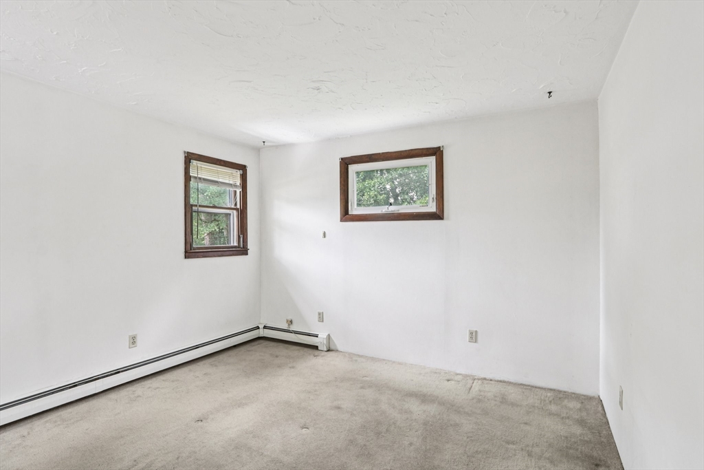 16 Indian Run Road Bellingham, MA 02019 - Photo 13 of 34 an empty room with windows