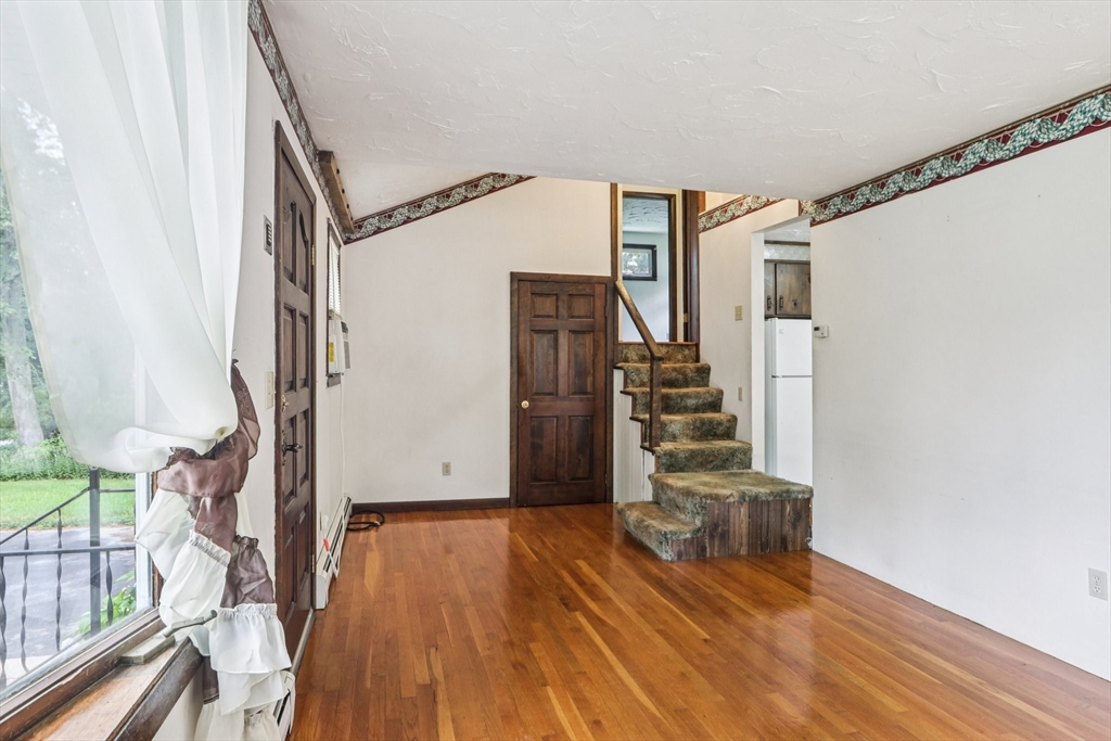 16 Indian Run Road Bellingham, MA 02019 - Photo 4 of 34 a view of entryway with wooden floor