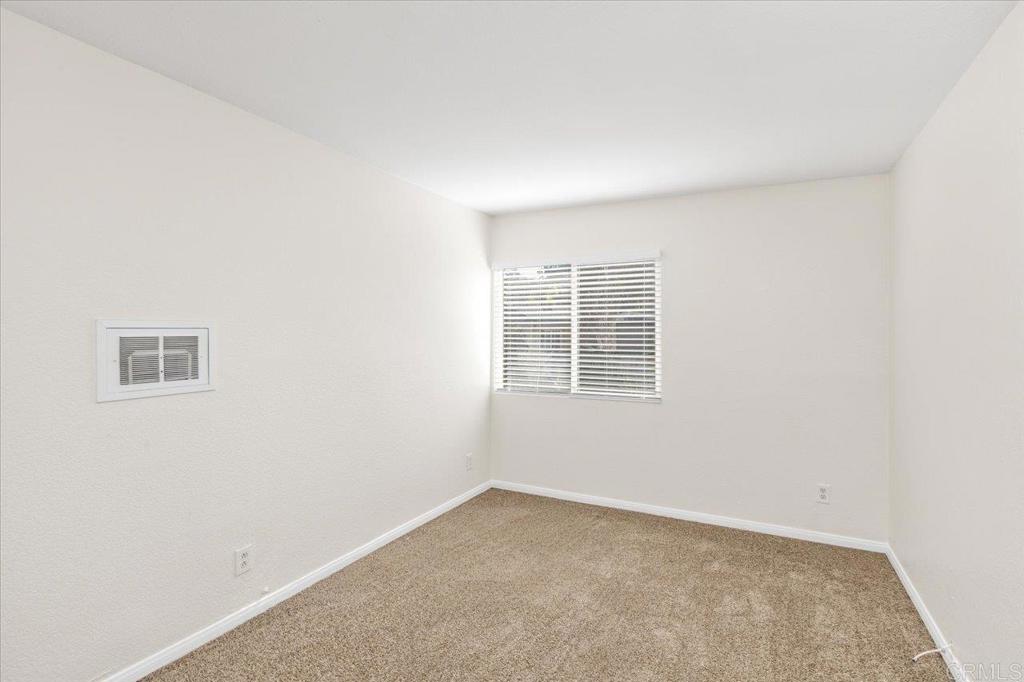 868 East Alvarado Street, Unit 27 Fallbrook, CA 92028 - Photo 12 of 20 an empty room with a window