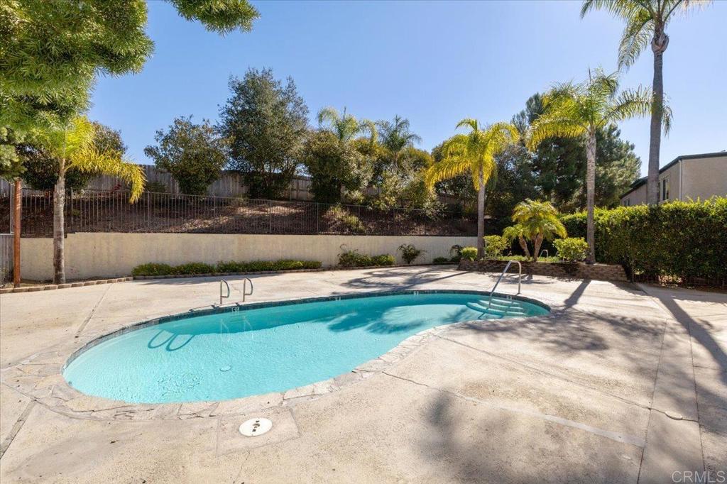 868 East Alvarado Street, Unit 27 Fallbrook, CA 92028 - Photo 17 of 20 a view of backyard space and swimming pool