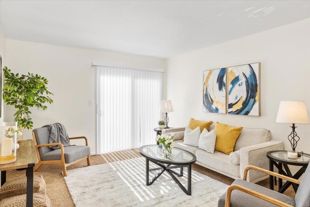 868 East Alvarado Street, Unit 27 Fallbrook, CA 92028 - Photo 3 of 20 a living room with furniture and a potted plant