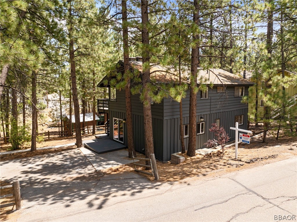 39596 Forest Road Big Bear Lake, CA 92315 - Photo 13 of 50 a view of a house with a yard