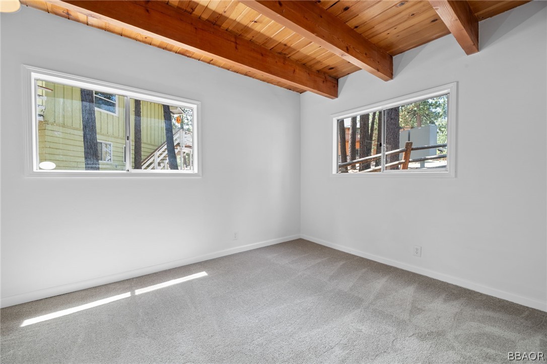 39596 Forest Road Big Bear Lake, CA 92315 - Photo 29 of 50 a view of an empty room with a window