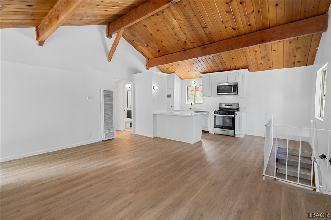 39596 Forest Road Big Bear Lake, CA 92315 - Photo 35 of 50 a view of kitchen with furniture and wooden floor