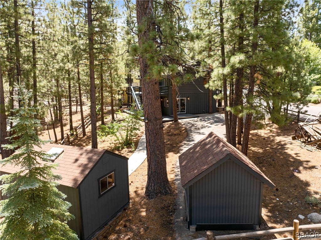39596 Forest Road Big Bear Lake, CA 92315 - Photo 4 of 50 a view of a house with a yard