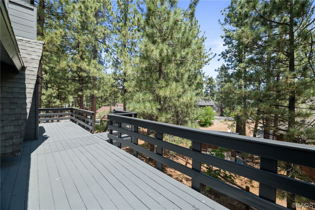 39596 Forest Road Big Bear Lake, CA 92315 - Photo 46 of 50 a balcony with wooden floor