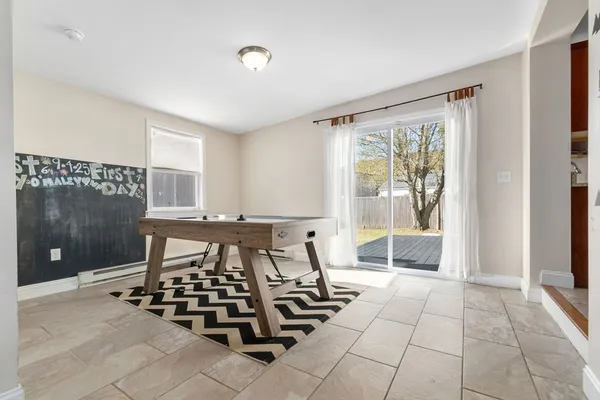 a view of a livingroom with furniture and window