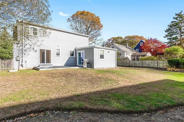 a bathroom with a sink and a yard