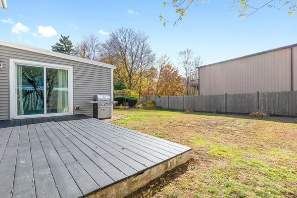 a view of a backyard of the house
