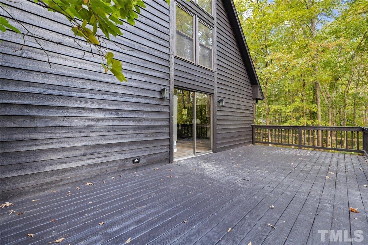 5816 Shannas Way Durham, NC 27713 - Photo 31 of 40 a view of a house with a deck