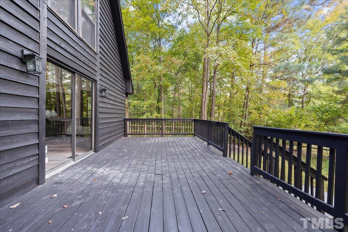 5816 Shannas Way Durham, NC 27713 - Photo 32 of 40 a view of deck with wooden floor and fence