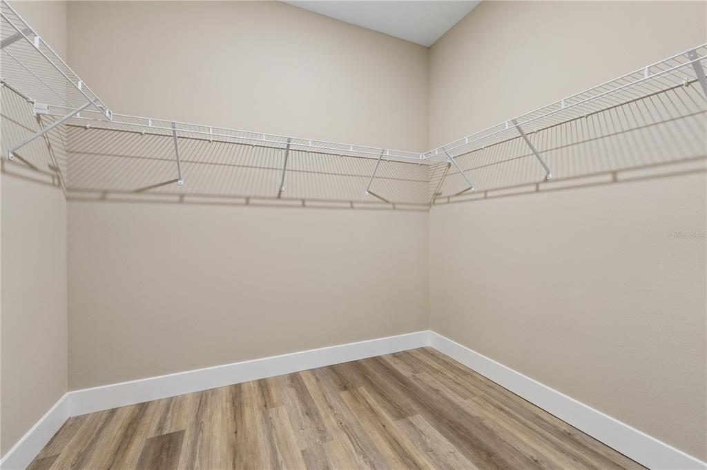 21 Postman Lane Palm Coast, FL 32164 - Photo 12 of 13 a view of a room with racks on the wall