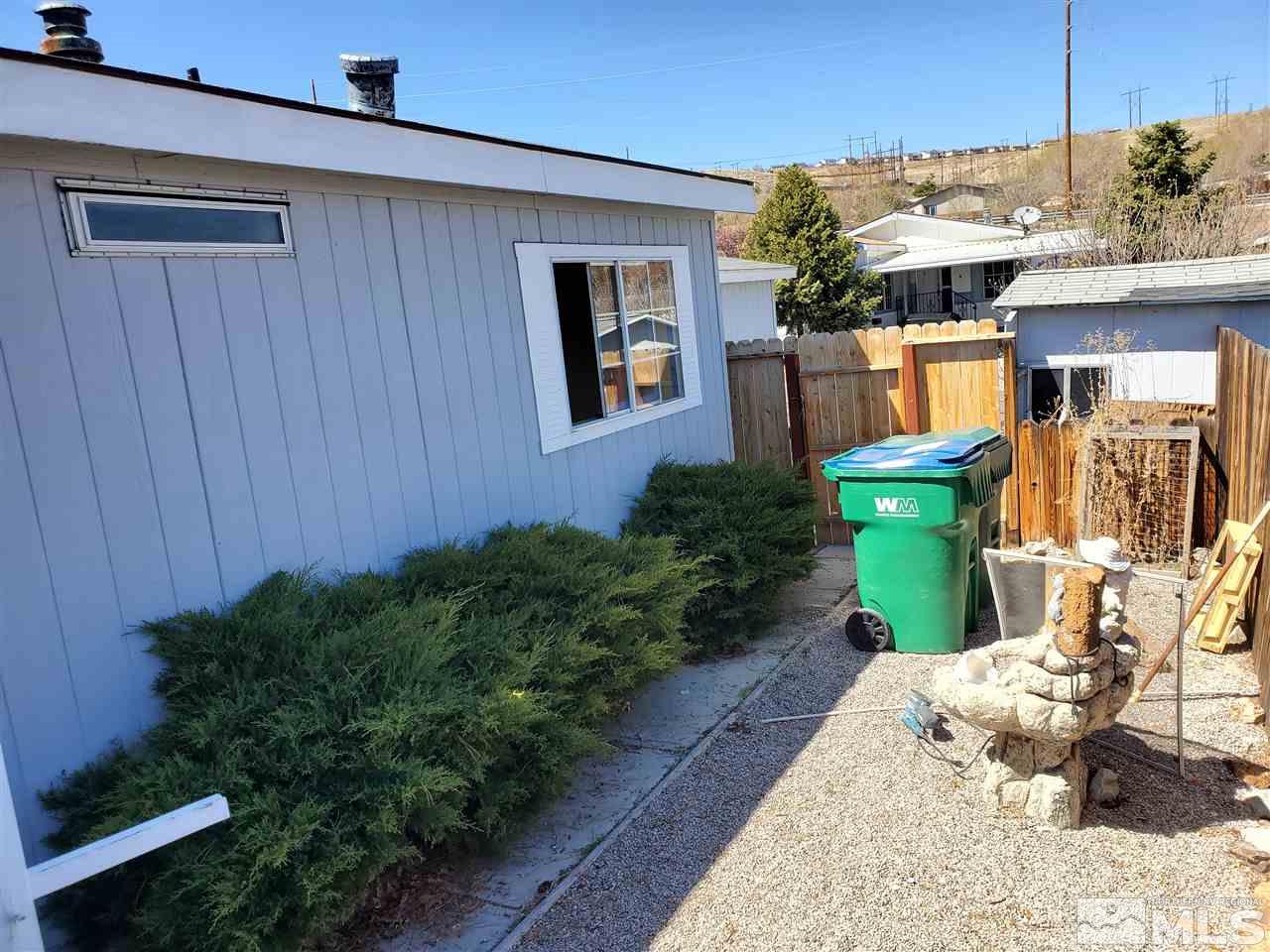 2146 Barberry Way Reno, NV 89512 - Photo 15 of 18 a view of a back yard of the house
