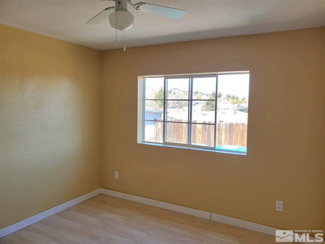 2146 Barberry Way Reno, NV 89512 - Photo 6 of 18 an empty room with a window