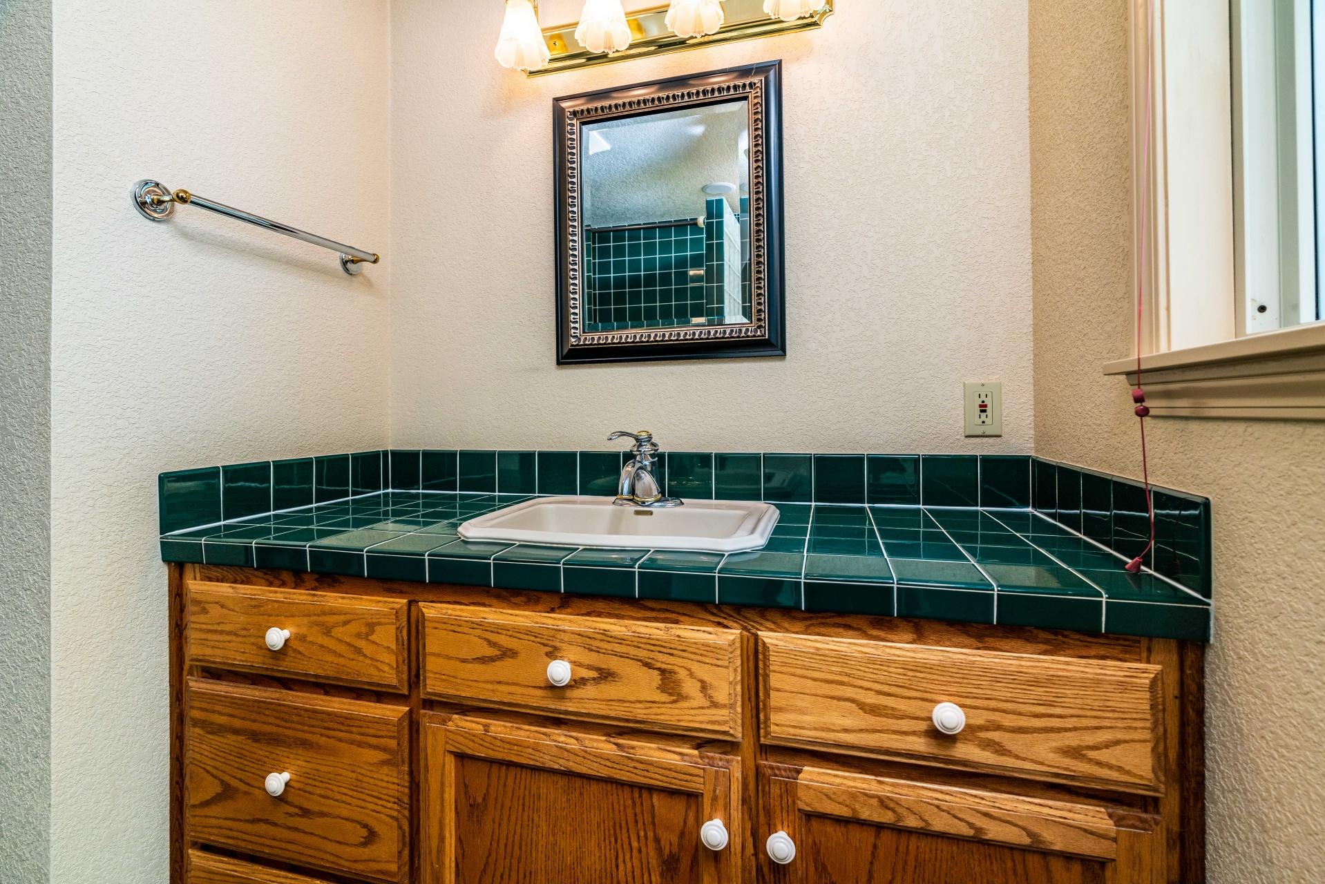 61919 Dobbin Road Bend, OR 97702 - Photo 11 of 57 a view of a sink storage and utility room